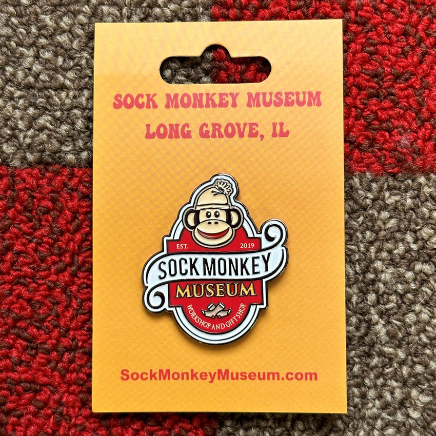 SOCK MONKEY MUSEUM ENAMEL PIN